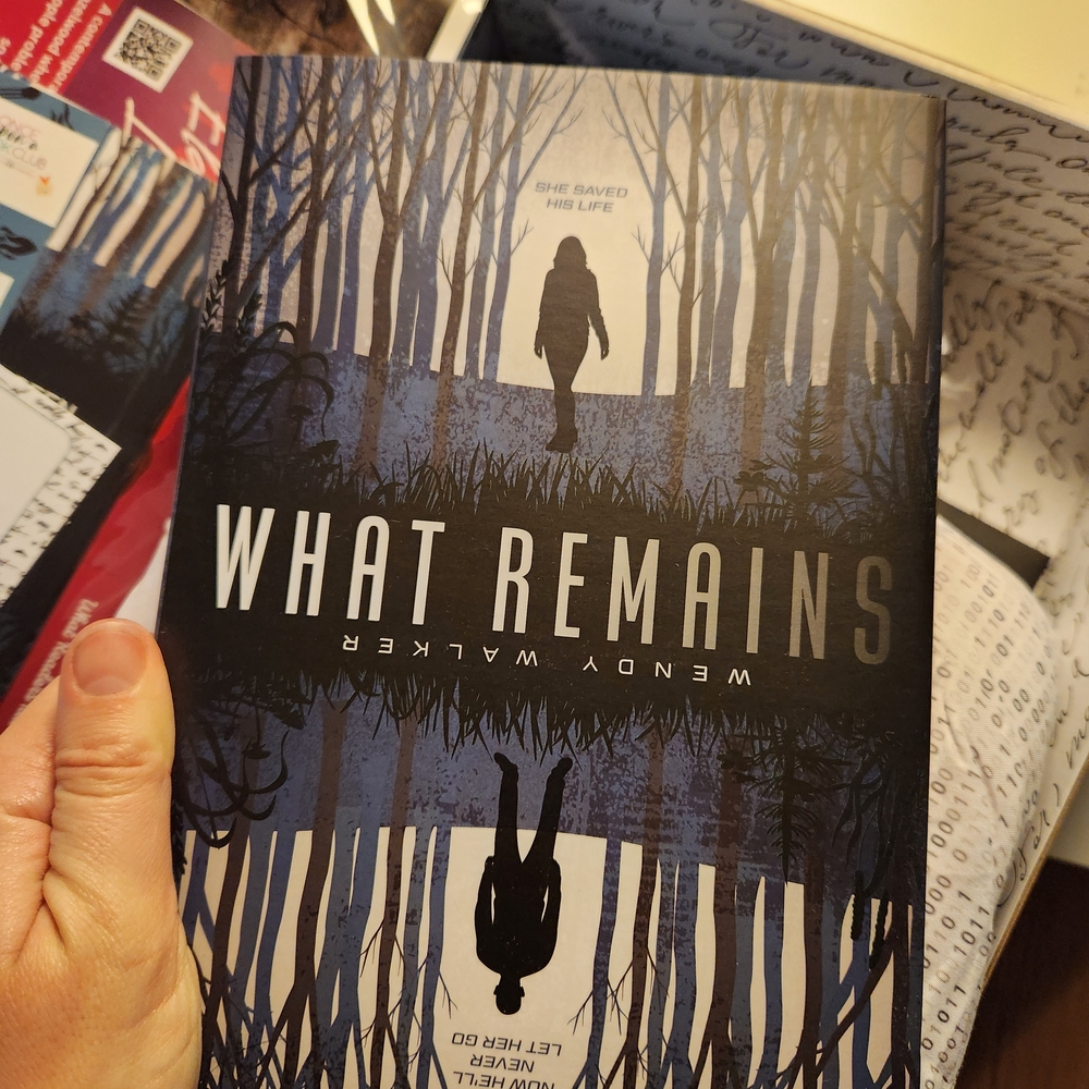 'What Remains' Book - Blue Cover